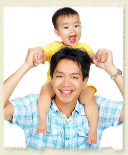 stock photo of father with braces and son