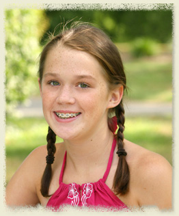 stock photo of a teen girl with braces